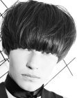 Trendy male bowl cut with intense texture