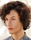 Long hairstyle with curls and volume for men