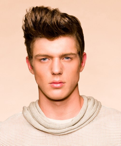 Men's hair with the bangs styled to the back
