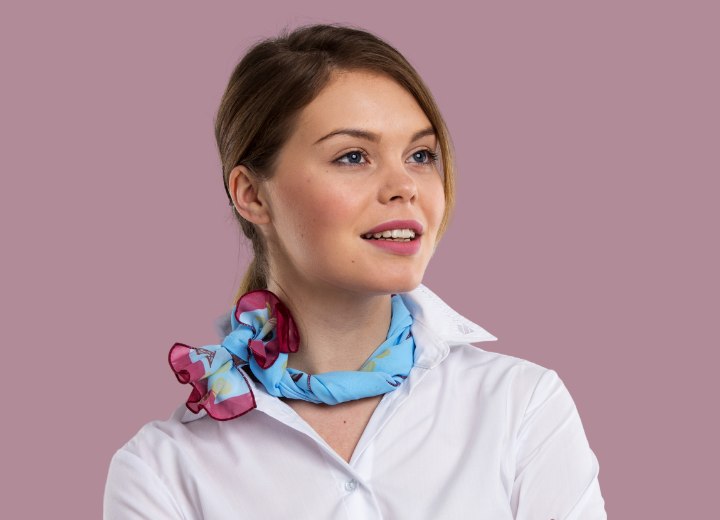 Woman who is wearing a neck knot scarf