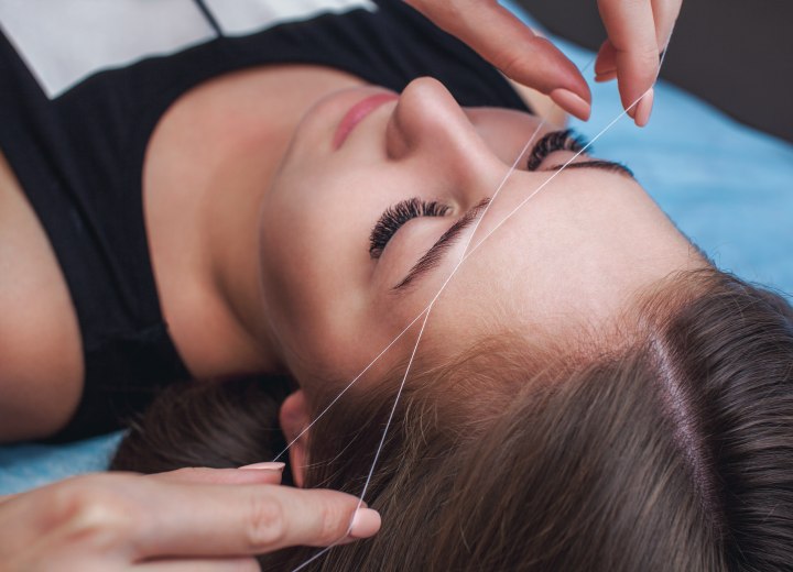 Hair removal with threading