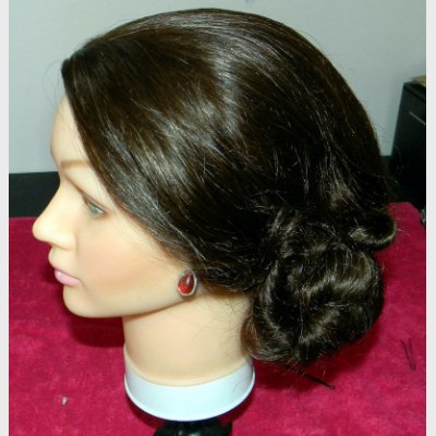 Hair in an up-style with a double twist