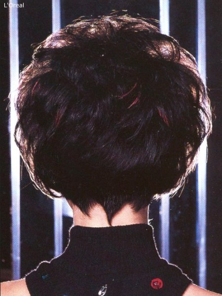 Back view of a short 1980s haircut