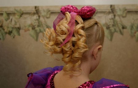 Young girl with her hair in spiral curls