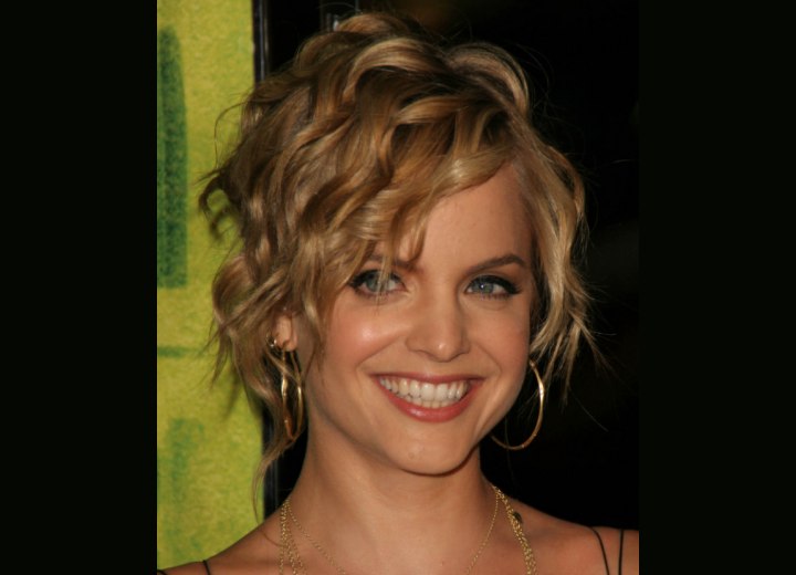 Mena Suvari with her hair in a semi-updo