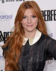 Bella Thorne sporting a retro look with long curled hair