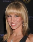 Deborah Gibson sporting a long hairstyle with angled sides and bangs