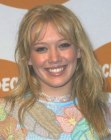 Hilary Duff with her hair cut into long layers and styled for high volume
