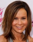 Jennifer Grey with her hair razor cut to a medium length with a fun texture