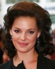 Katherine Heigl wearing medium length hair with curls that cover her neck