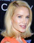 Kelly Lynch rocking a just above the shoulders hairstyle