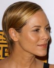 Maria Bello wearing her short hair with sleek gel styling