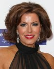 Natasha Kaplinsky's professional neck length hairstyle