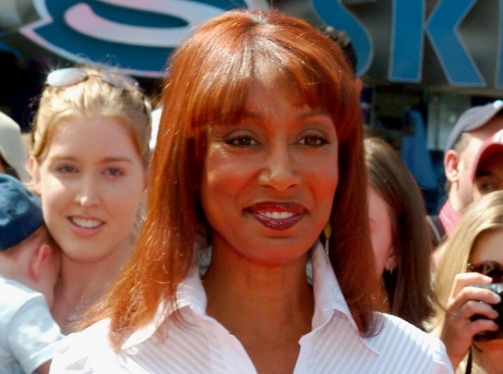 Tanya Boyd with shoulder-length red hair