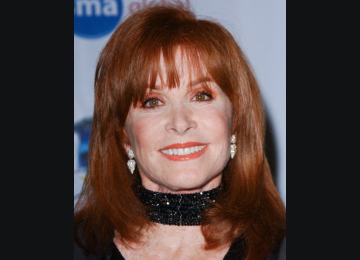 Hairstyle with spaced-out bangs - Stefanie Powers