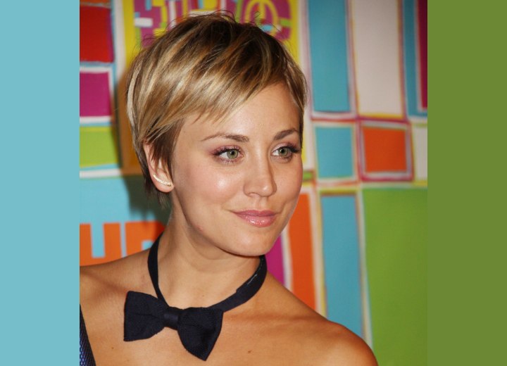 Kaley Cuoco with her hair in a pixie cut