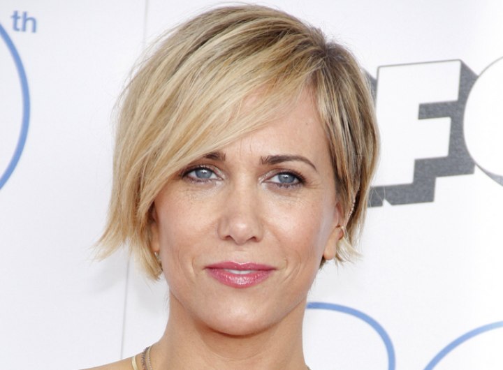 Kristen Wiig with her hair in a pixie cut