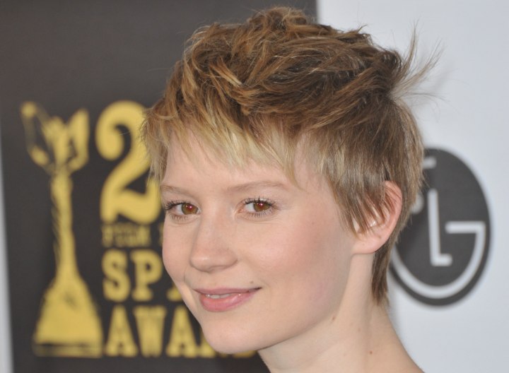 Mia Wasikowska with her hair in a short pixie cut
