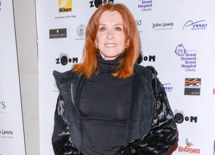 Stefanie Powers wearing a scrunched turtleneck dress