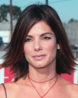 Sandra Bullock wearing her hair in a flippy medium length style