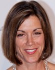 Wendie Malick's middle of the neck bob with curved in ends