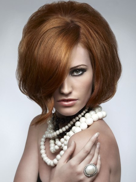 Medium-length hairstyle with lift in the back