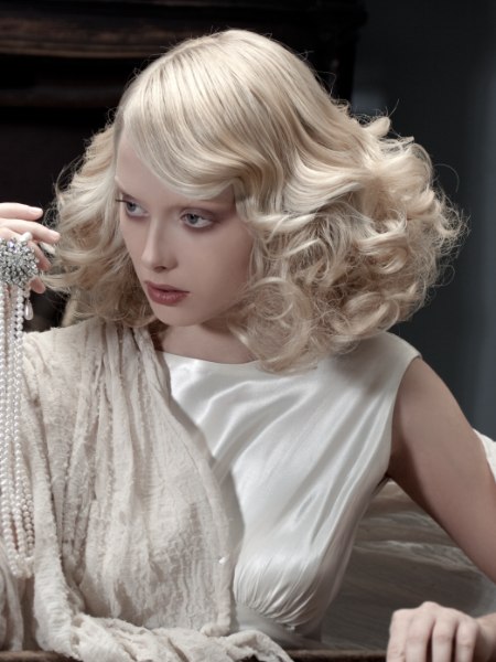 Blonde medium-length hair with large finger waves