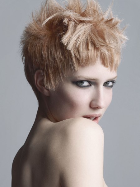 Radical short haircut with a supershort graduated neck