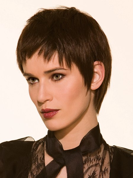 Short gamine haircut with elongated tapering in the nape area