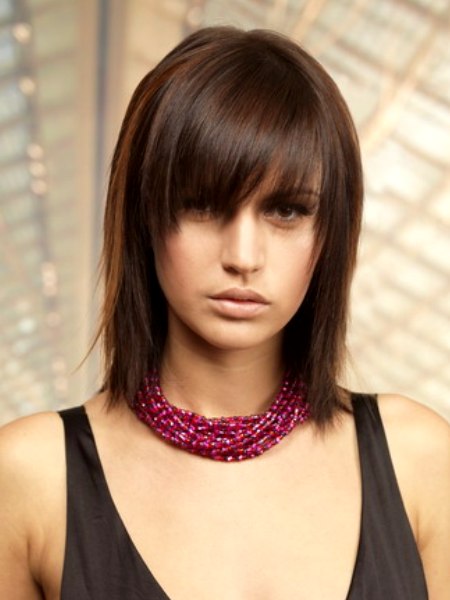 Brown medium-long shag with deep bangs