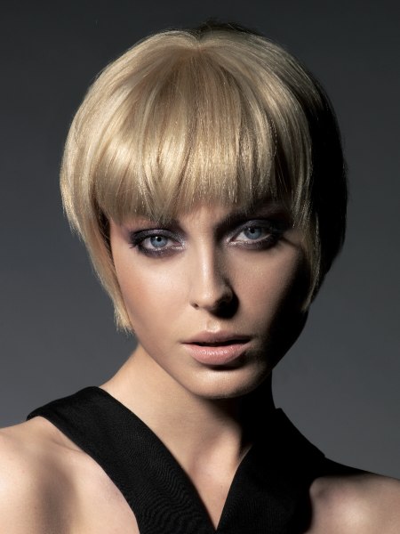 Retro pixie cut with razor cutting
