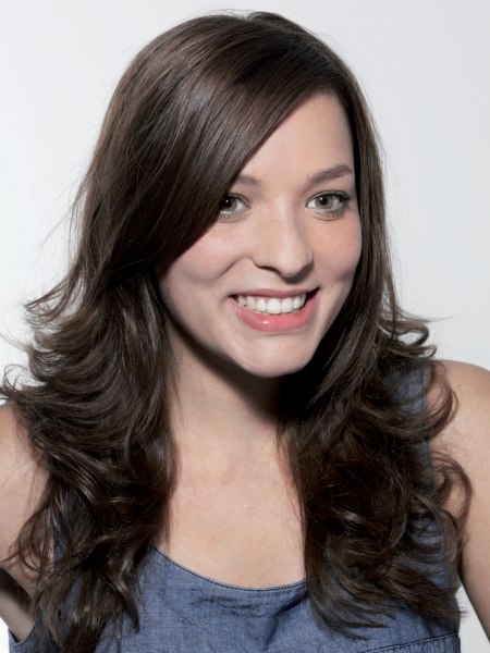 Long brunette hair with a long diagonal fringe
