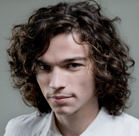 Long hairstyle for men with curls