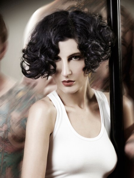 Just below the cheekbones haircut with curls