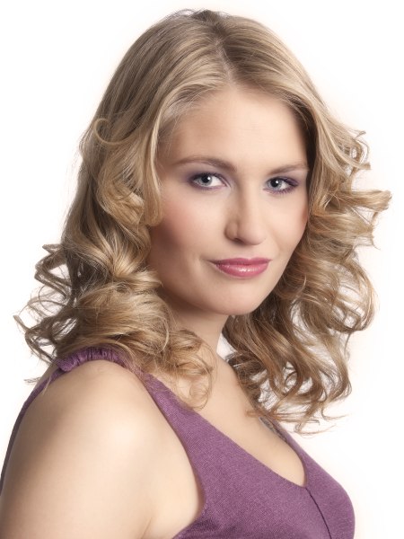 Long blonde hair styled with a butterfly effect