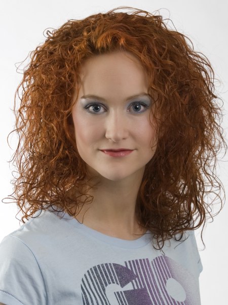 Long layered hairstyle with airiness for curly hair