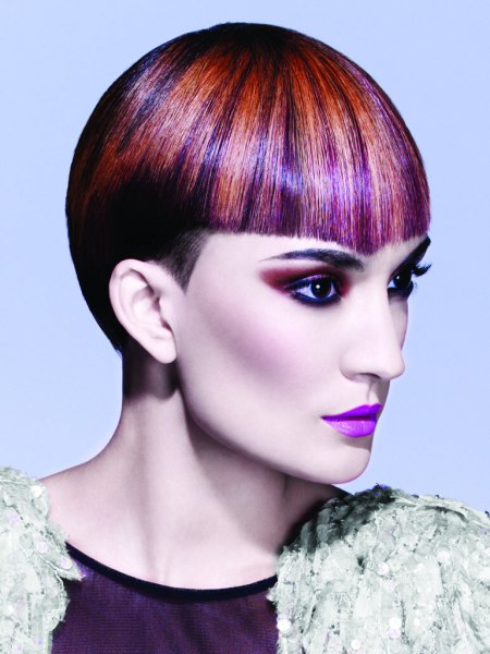 Short haircut featuring a fringe with a sharpened point