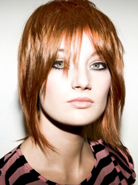 Hair cut in a long bob and pixie cut combination