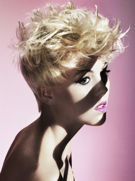 Short blonde hairstyle with a quiff shape