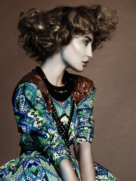 Medium-length hair with high-volume curls