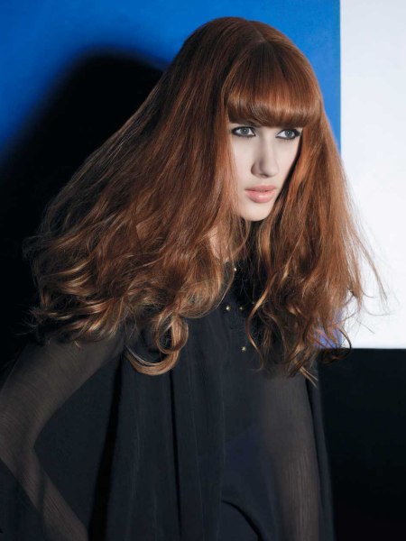 Very long hair with softened waves and curls