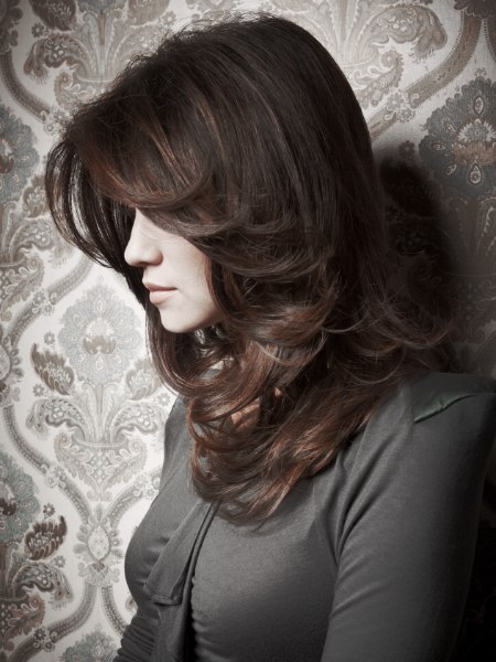 Long chestnut brown hair with a tapered edge