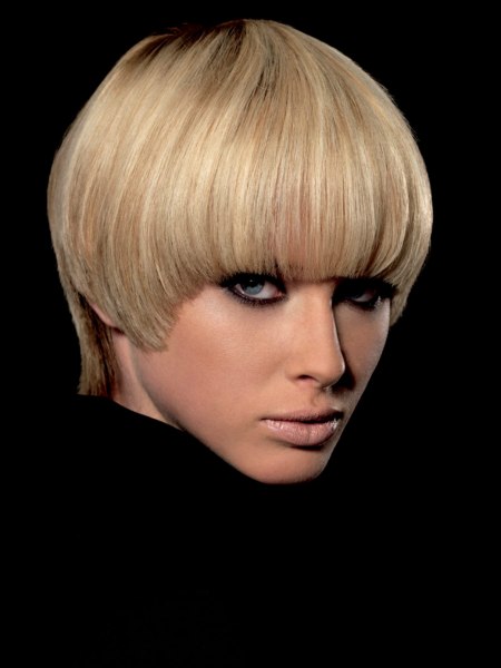 Modern pudding-bowl cut or Purdey for blonde hair