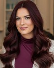 Long dark red hair with waves