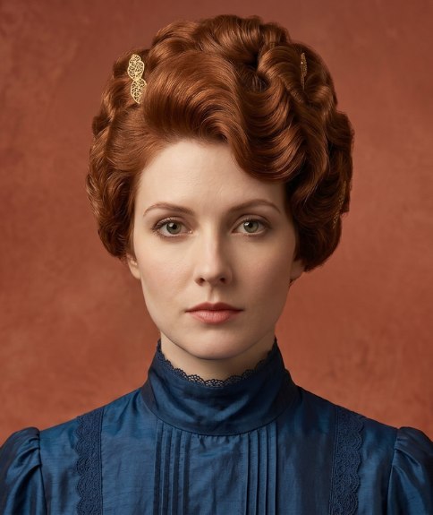 Stunning red hair, styled into a voluminous updo