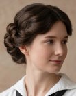 Hairstyle with a braided bun