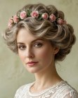 Updo with a wreath of pink roses