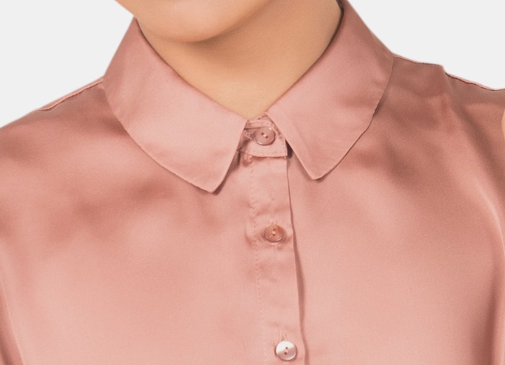 Shiny blouse with a buttoned up collar