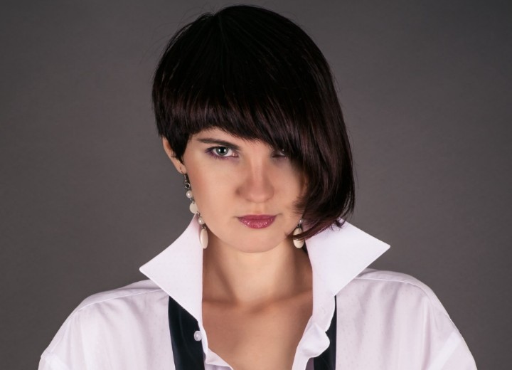 Woman wearing a shirt or blouse with the collar popped up