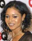 black hair with curls - Tamala Jones